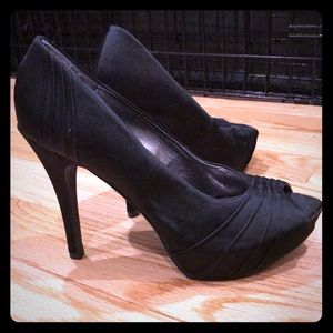 Stunning black peep toe heels!